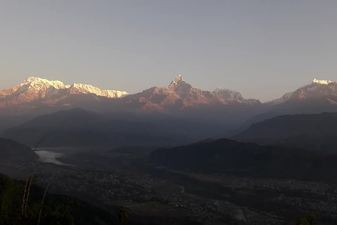 10 Days Kathmandu Chitawan Pokhara Tour with Dhampus Trek - Day 4: Canoeing, birds, and Tharu culture