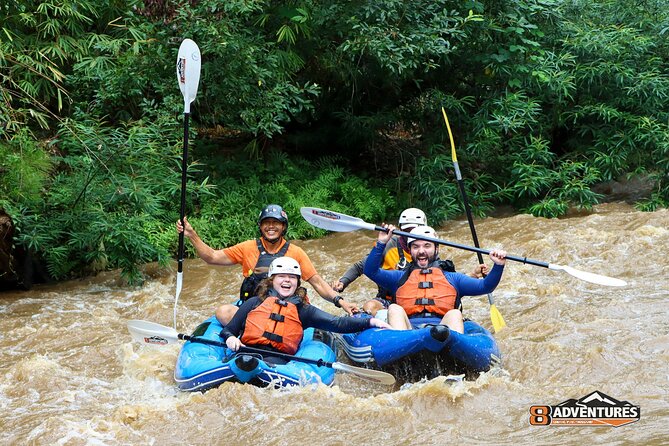 10KM Inflatable Kayaking and 3HR Trekking Adventure - Cooling off beneath the 10-meter waterfall