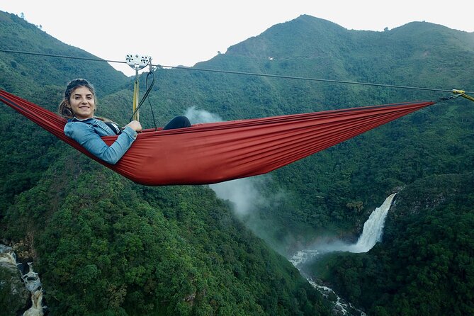 Aerial Hammocks, Zip and Waterfall Trek on Medellin Private Tour - The first flight at Los Saltos Ecoparque