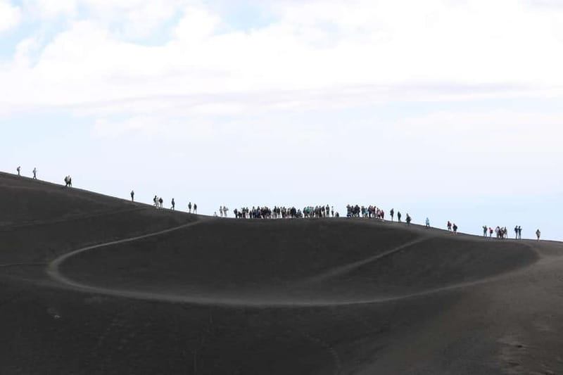 Catania, Etna trekking with guide and cable car at 3000 meters + transfer available - Who should book this hike?