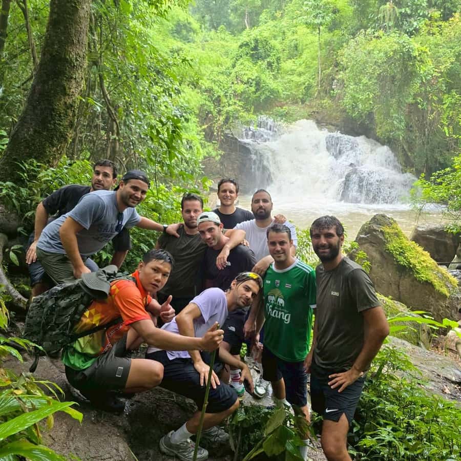 Chiang Mai: 1-Day Trekking Experience to Village & Waterfall - The trail through jungle and rice country