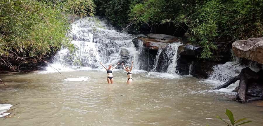 Chiang Mai: 2-Day Jungle Trek with Elephant Farm & Raft Ride - Walking through fields and forest to a waterfall