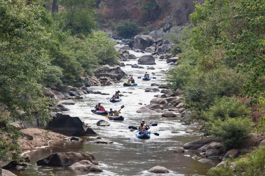 Chiang Mai: 3-Hour Trekking and Inflatable Kayaking Tour - Cooling off beneath the 10-meter waterfall