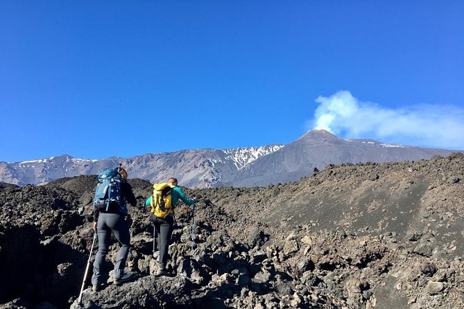 Etna Grantour - 4x4 & trekking - Private tour with lunch included - Entering a lava tube with helmet and lights