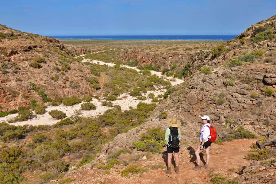 Exmouth: Cape Range Explorer One-Day Trekking Adventure - Walking through Cape Range’s red gorges