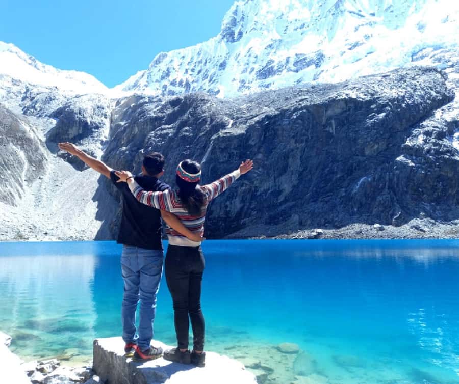 From Huaraz: Lake 69 Trek Day Tour - White Mountain Range - Reaching the turquoise water of Lake 69