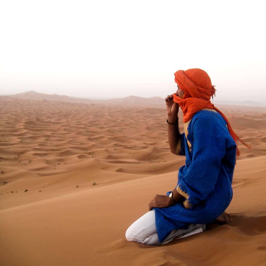 From Zagora: 3-Desert Tour to Erg Chigaga Dunes & Caml Trek - Day two: sunrise, camels, sandboarding, and a nomad family