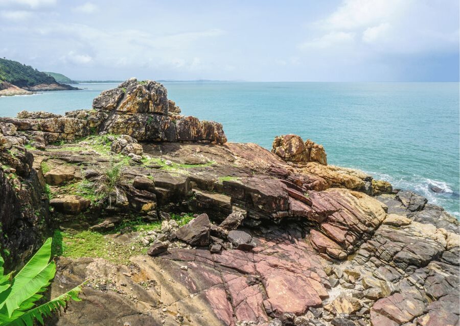 Gokarna Nature Walk (3 Hours Guided Trekking Experience) - A long sandy beach near a prominent temple