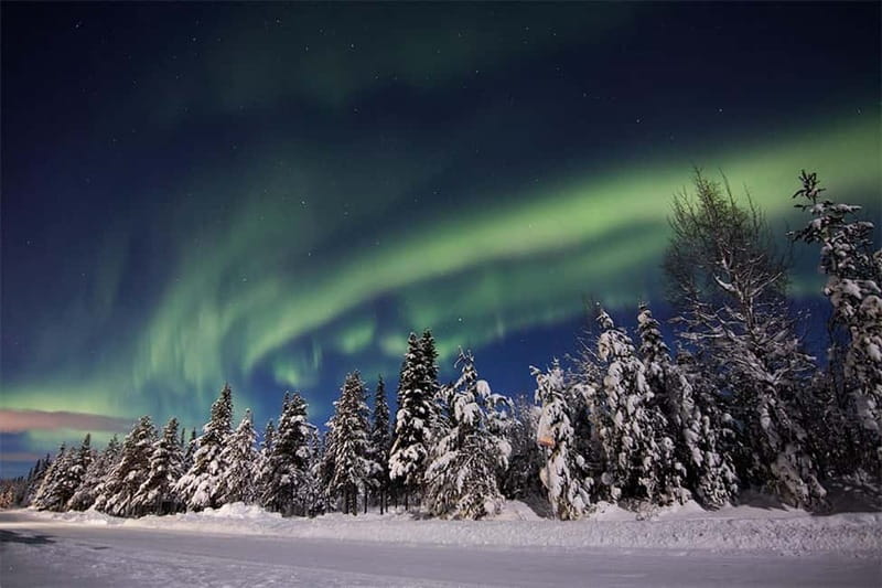 Kiruna: Snowshoe Trek with Aurora Hunt and Warm Beverage - Getting dressed for a Kiruna winter evening