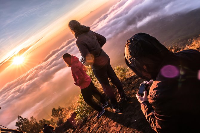 Mount Batur Sunrise Trekking and Rice Terrace Adventure - The descent reveals a different Mount Batur