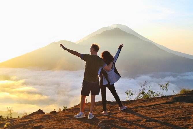 Mount Batur Sunrise Trekking Open Trip All-Inclusive - Starting the climb with a local mountain guide