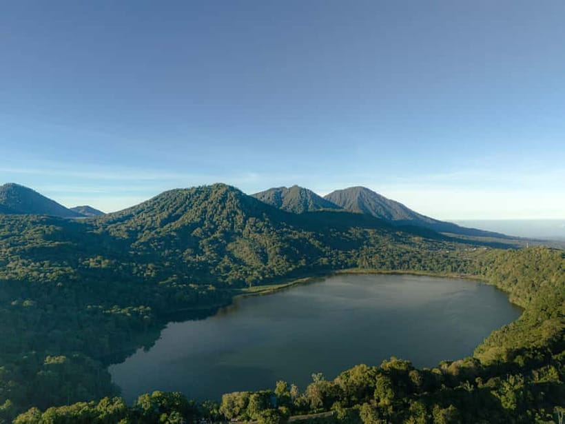 Munduk Jungle Trek: Twin Lakes View, Temple and Waterfall - Crossing the lake by traditional canoe