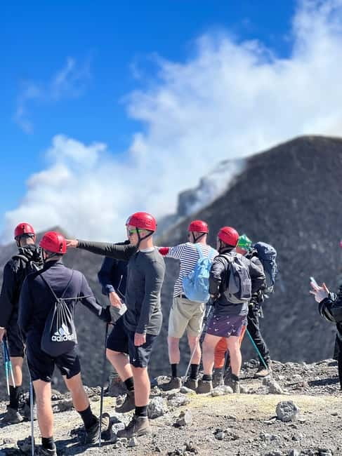 Nicolosi: Mount Etna Central Crater Guided Trekking Tour - Views toward the Ionian coast and Valle del Bove