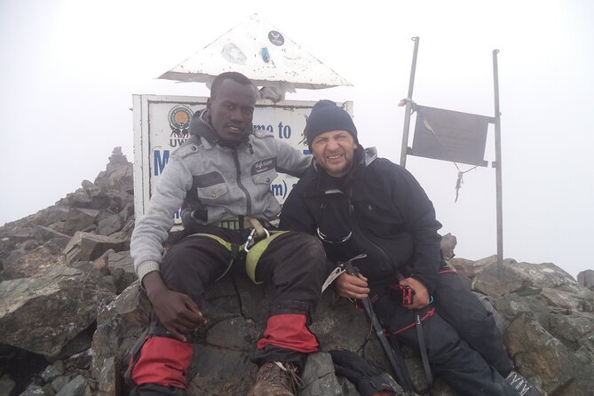 Rwenzori Mountains Trekking with Margherita Peak Summit - Day 2: Bamboo forest, slippery rock, and John Matte Hut