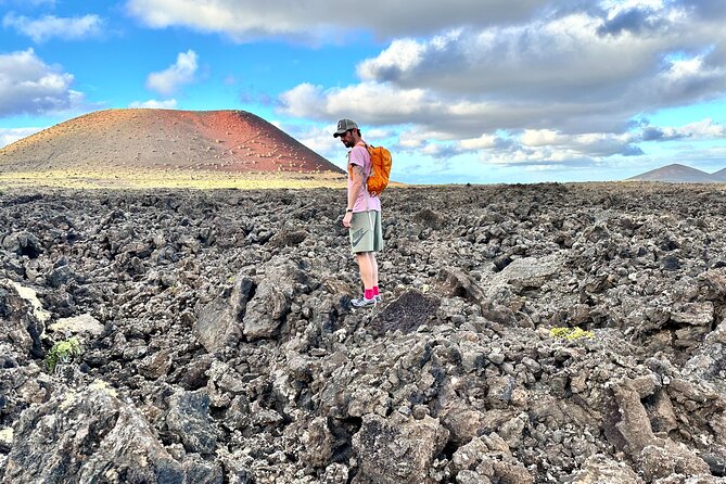 Timanfaya National Park Trekking with a Typical Canarian Snack - Walking into El Cuervo’s volcanic crater