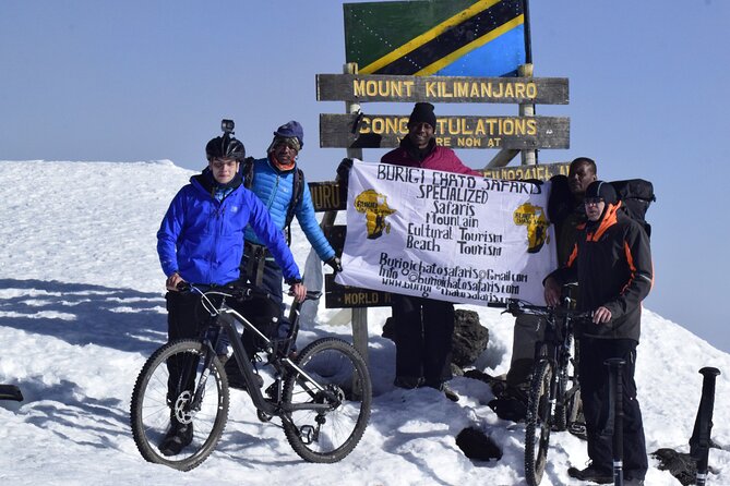Top 6 Days Mt. Kilimanjaro Bike trek Tour by Marangu-Kilema Route - Day five: Gilman’s Point, Uhuru Peak, and the ride down