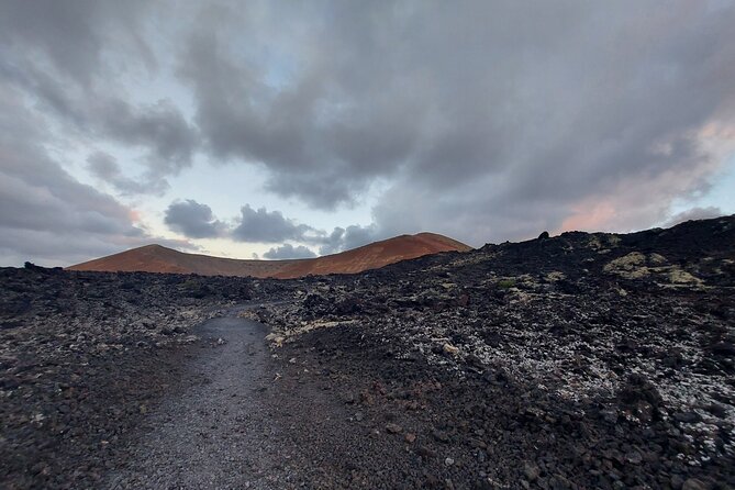 Trekking in the Volcanoes Natural Park in a small group - Walking Through Lava, Craters, And Old Fire