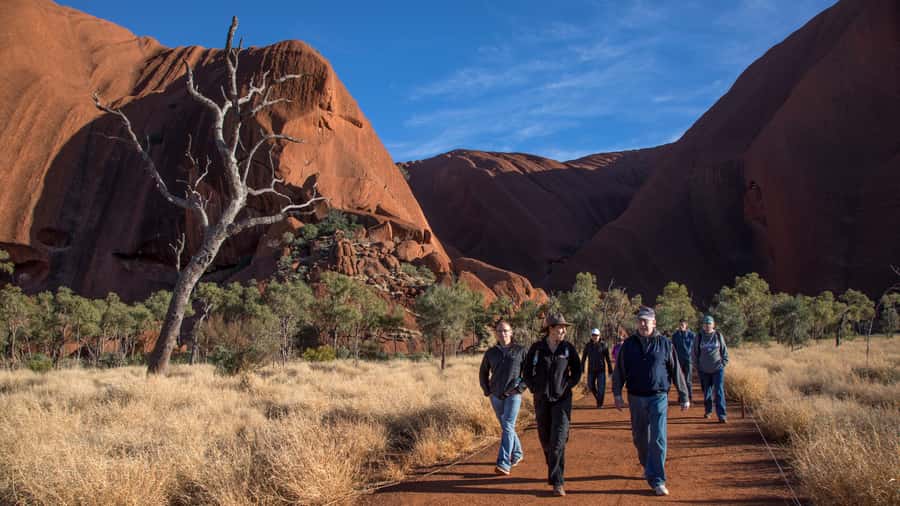 Uluru: Guided Trek of Uluru's Base in a Small Group - Walking the entire base, not just the famous side
